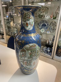 A Chinese famille verte powder blue-ground vase and a famille rose vase, 19th C.